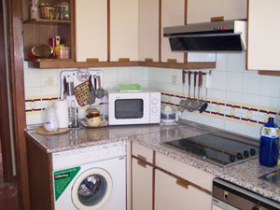Wide flat totally furnished,  3rd floor, with sight of the Sierra Nevada of Granada.. Oasis Real Estate. Houses in Granada, Spain.