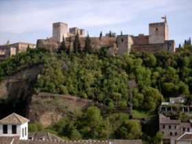 House with a 100 m2 yard and a sight of the Alhambra of Granada. Heating on the floor. . Oasis Real Estate. Houses in Granada, Spain.