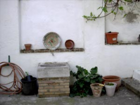 House with a 100 m2 yard and a sight of the Alhambra of Granada. Heating on the floor. . Oasis Real Estate. Houses in Granada, Spain.